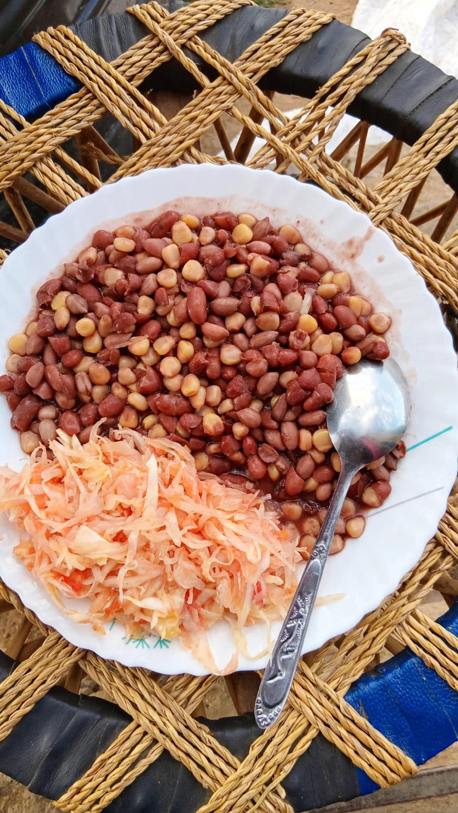 Maureen’s boiled githeri served with cabbage for supper